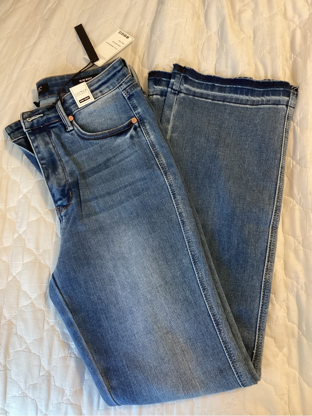 Judy Blue Light-Medium Blue Boot Cut Jeans with Raw Hem